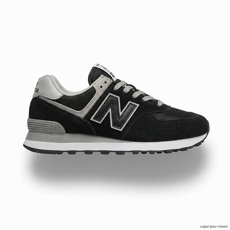New Balance retro-style black and grey sports shoes